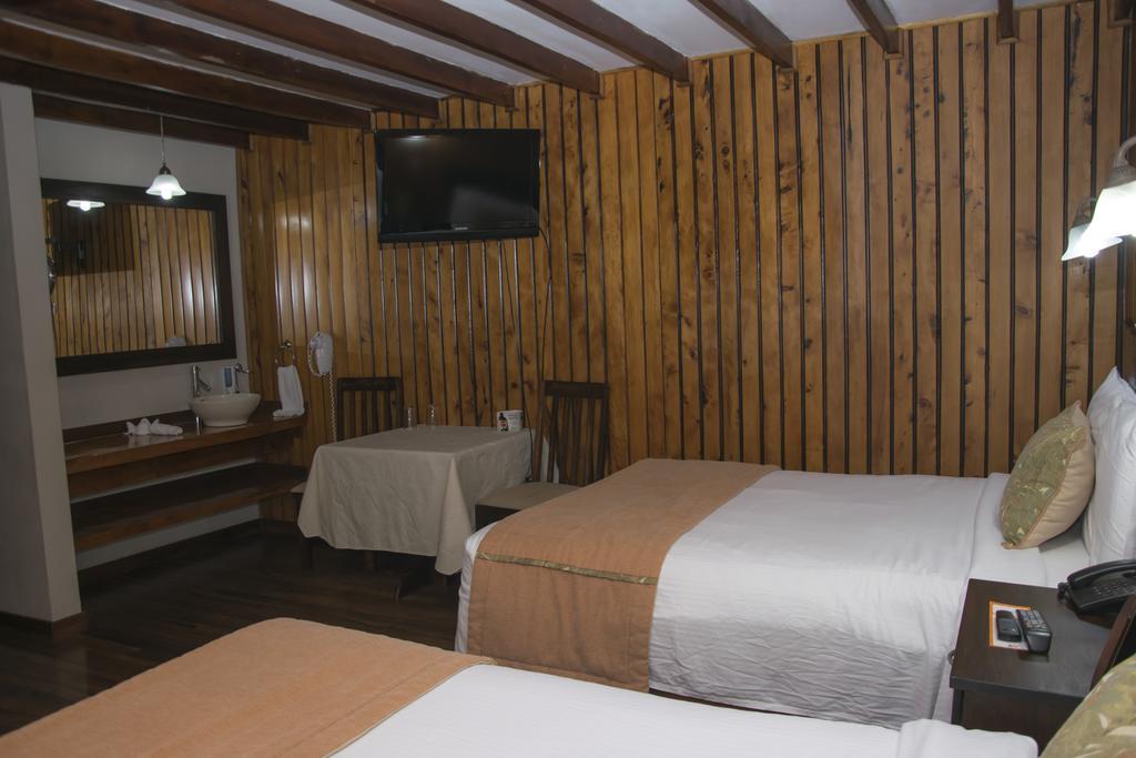 Hotel Chalet Tirol เอเรเดีย ห้อง รูปภาพ